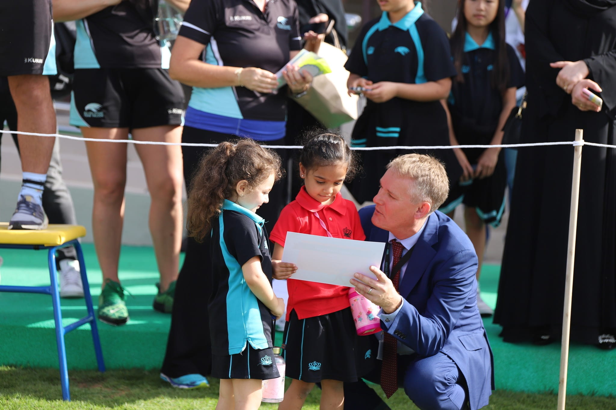 Head of Primary with students at Sports Day