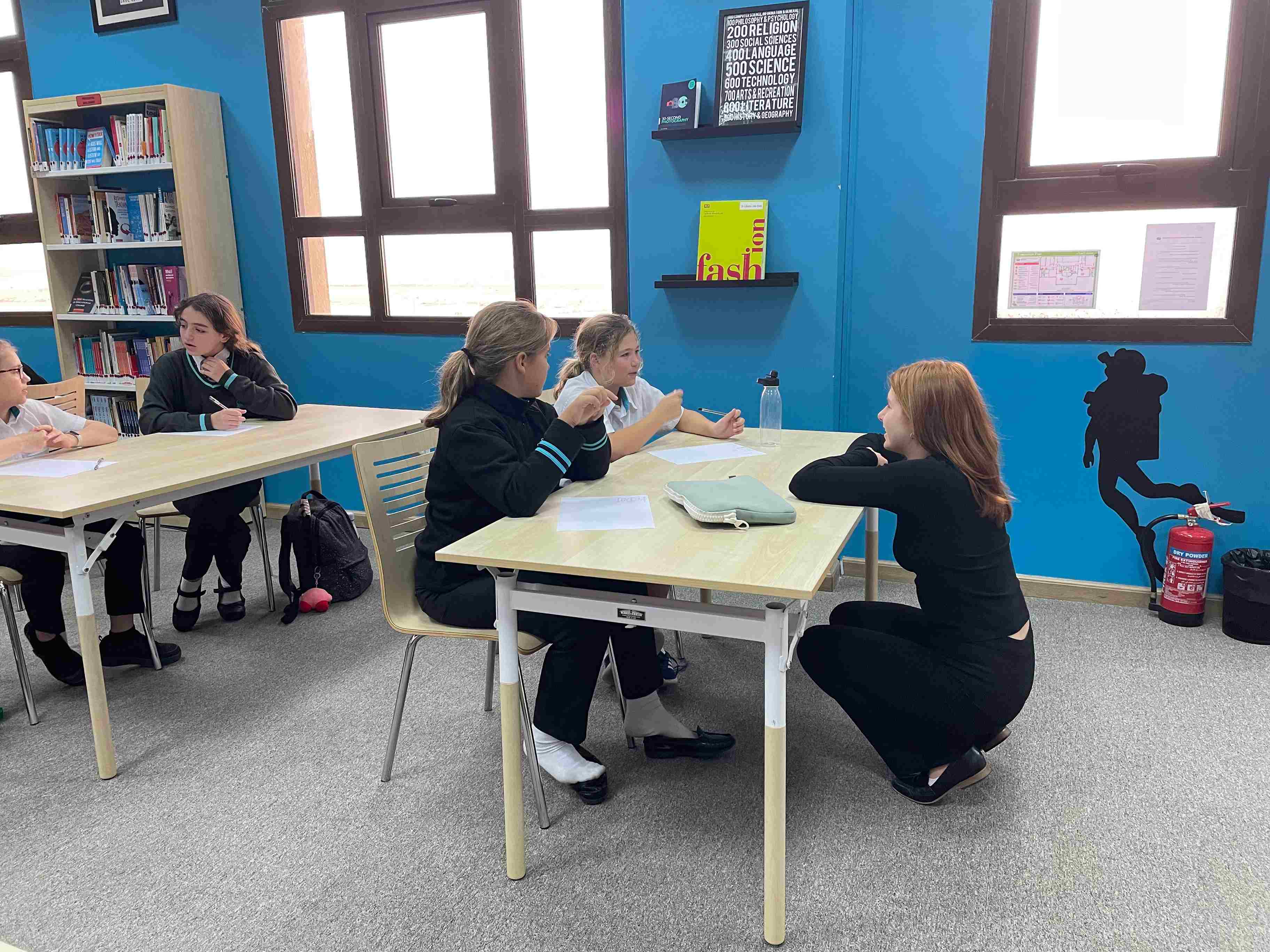 Students chatting in Buddy Workshop