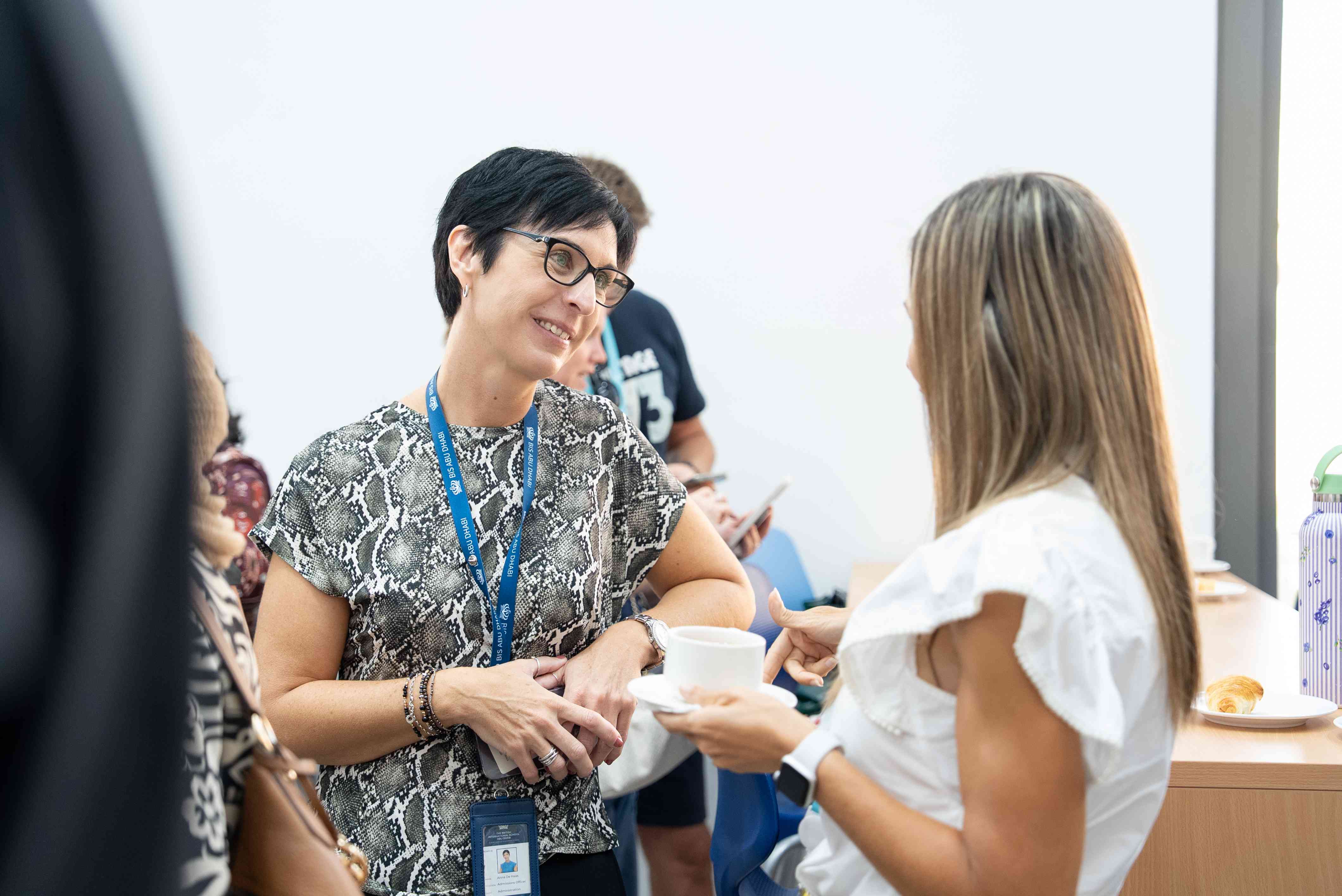 Anna speaking with a parent
