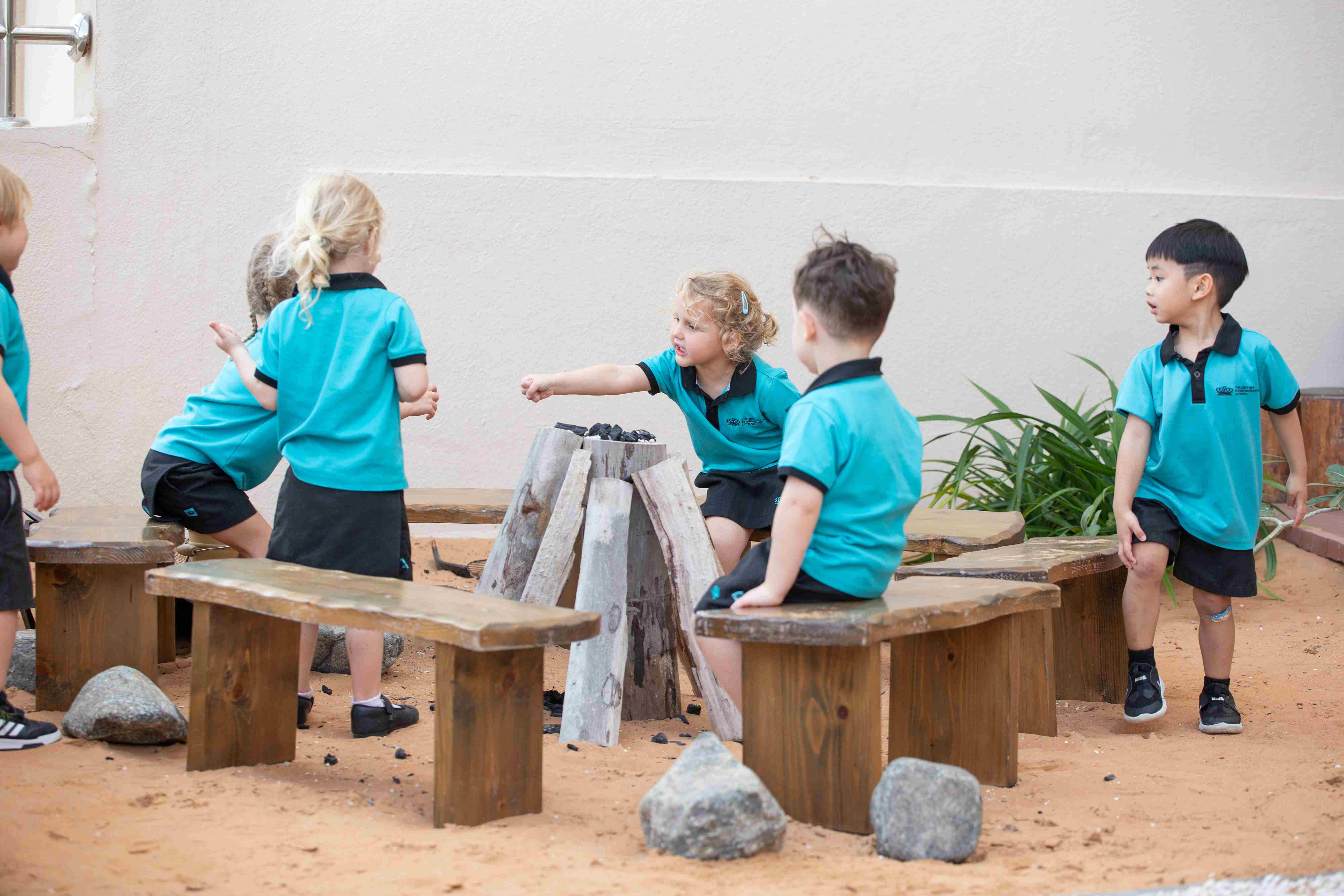 Roasting marshmallows in the Eco Edventure at The British International School Abu Dhabi
