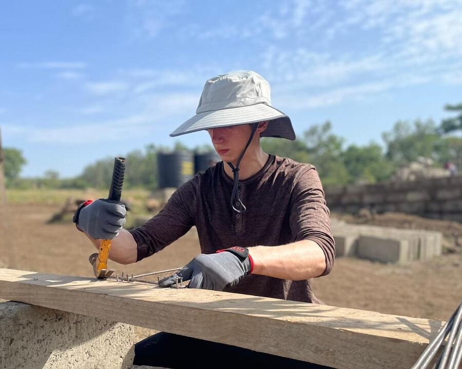 BISB Tanzania boy building