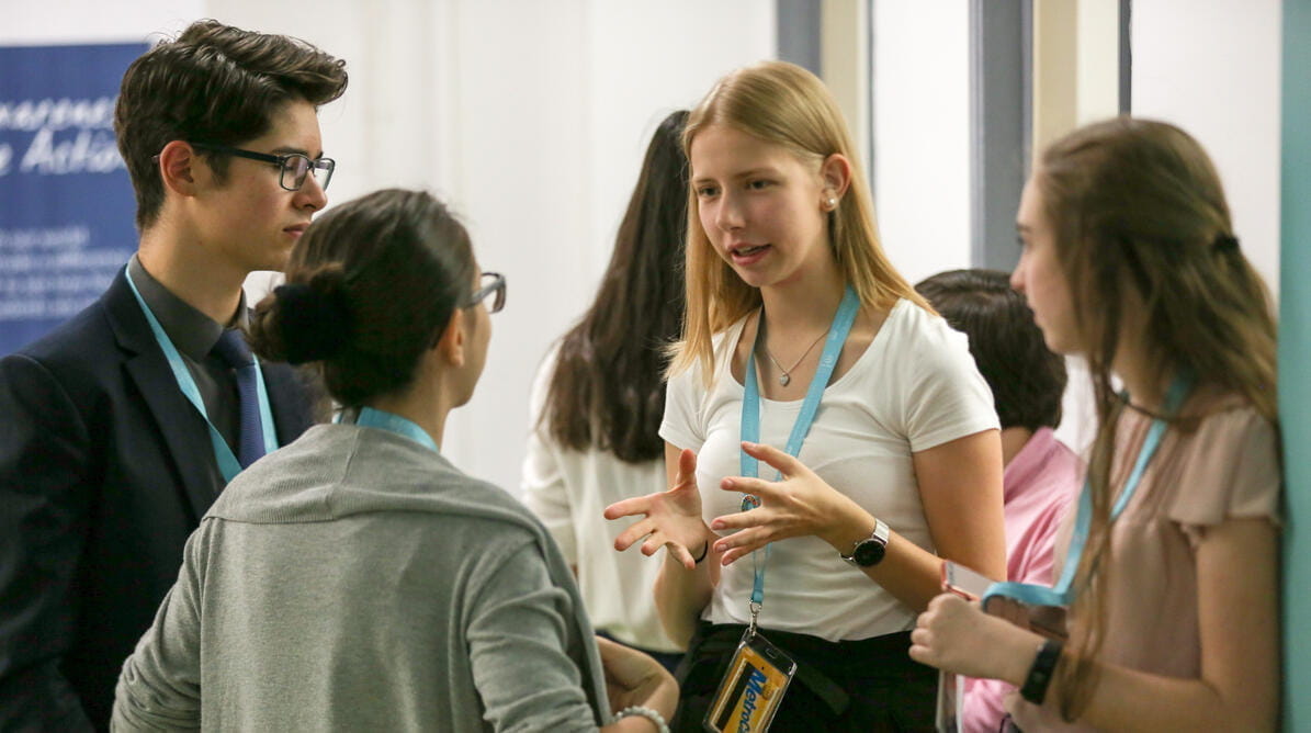 Students in discussion during Model UN event