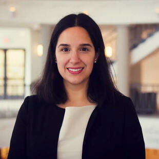 Member of staff team, smiling