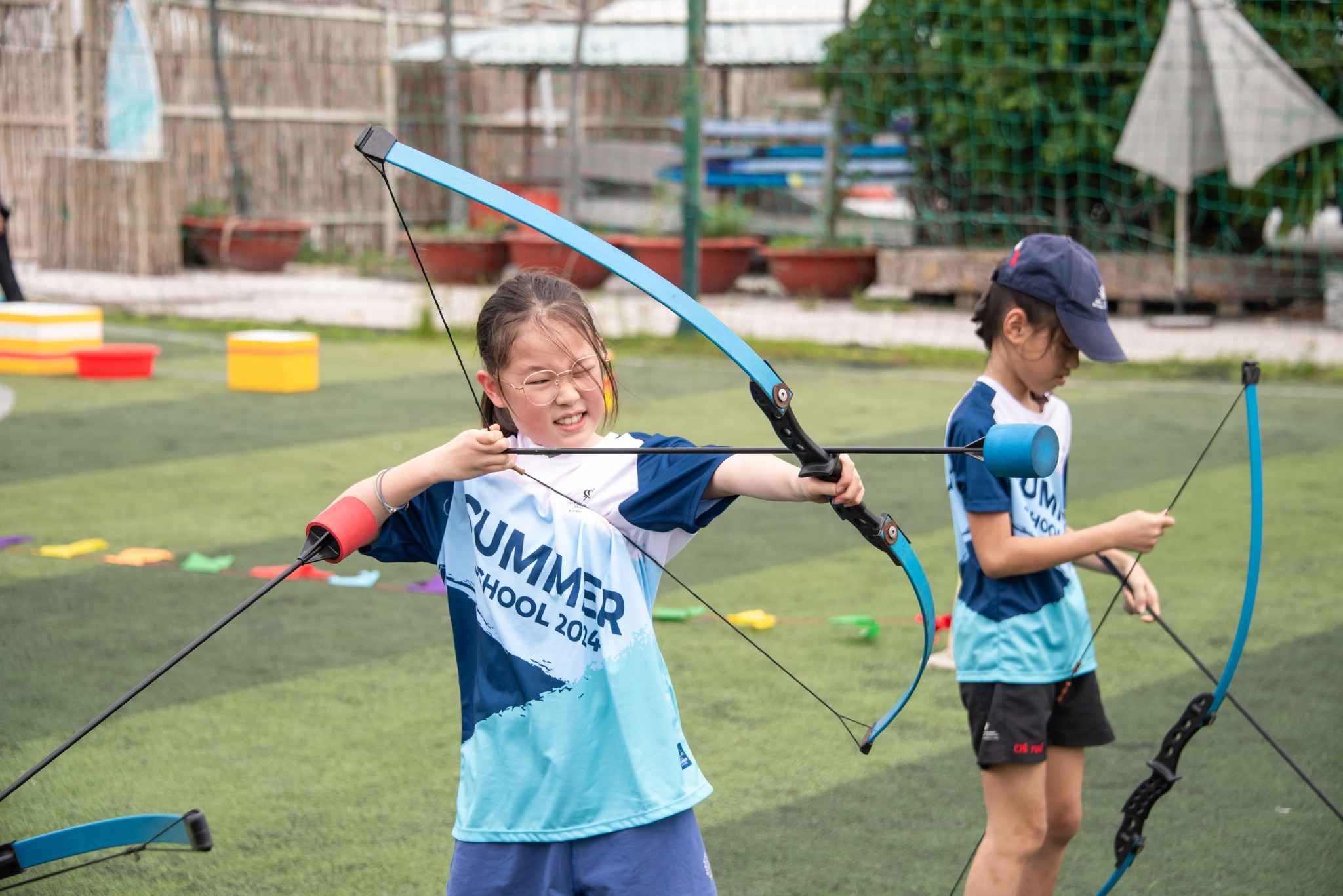 Summer School 2024 | Our students challenge their archery skills at the Archery Tag venue - Carousel For News Detail