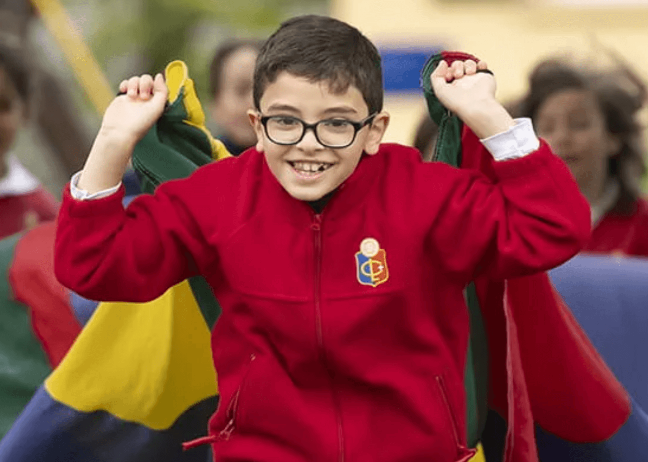 Child at Collège du Léman running with joy 