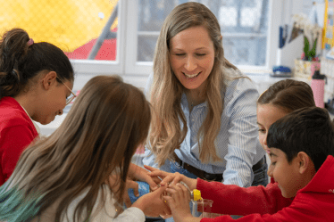A Primary teacher at Collège du Léman working on an experiment with her students