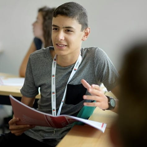 boy holding a book