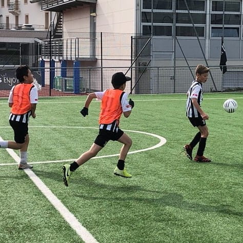 Boys playing football