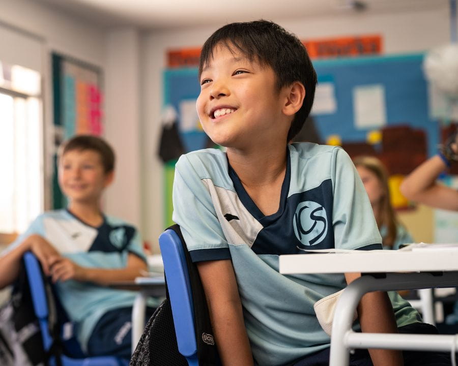 Boy smiling in class