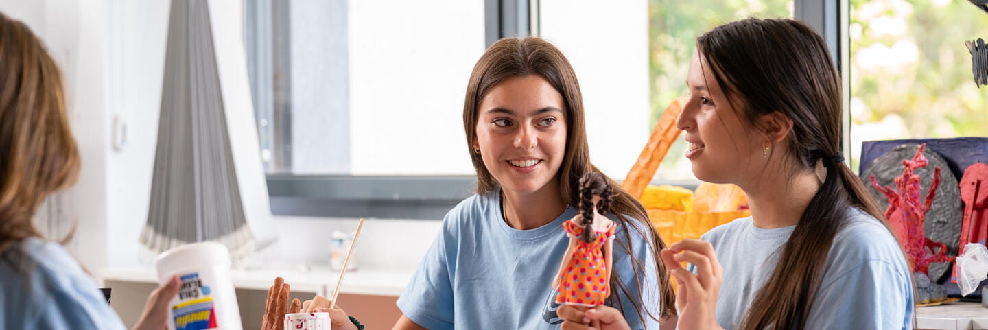 Girls at desk in classroom