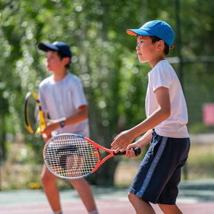 Boys playing tennis