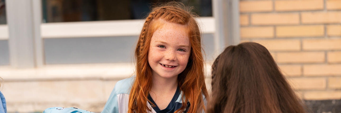Girl smiling at camera