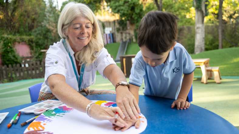 Teacher with a K3 Student