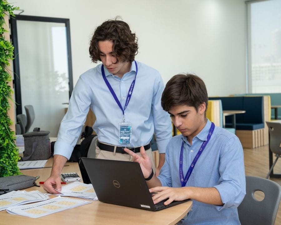 Sixth Form Students working on a project in a modern classroom