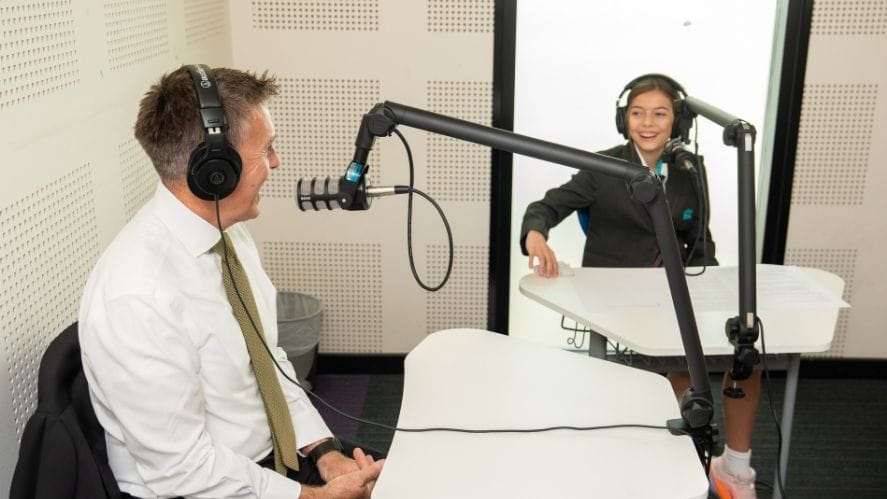 Podcast studio with principal and student interview