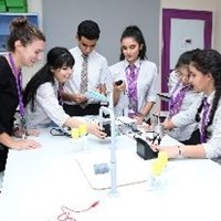 Teacher and students in Science