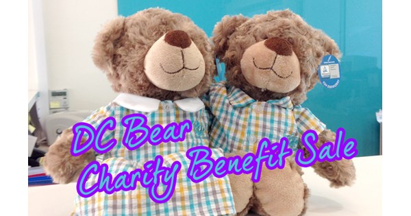 giving teddy bears to charity