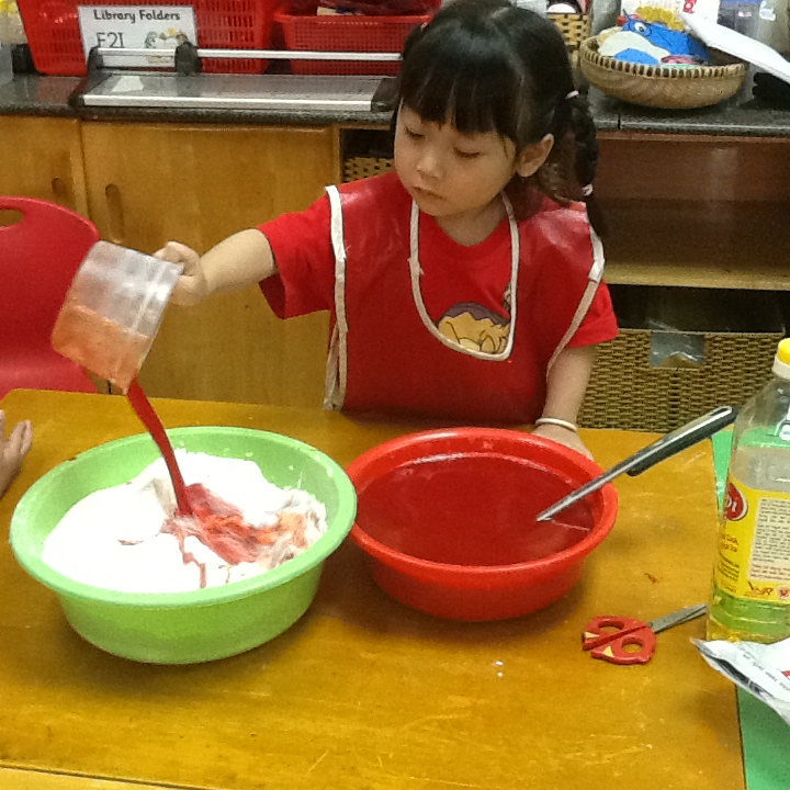 F2I Apple making playdough for Enterprise Day