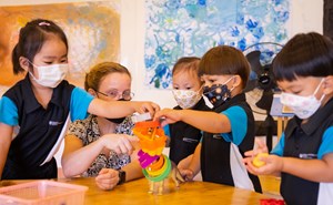 Image of children building an animal 