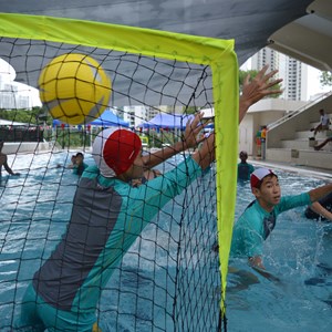 students playing water polo