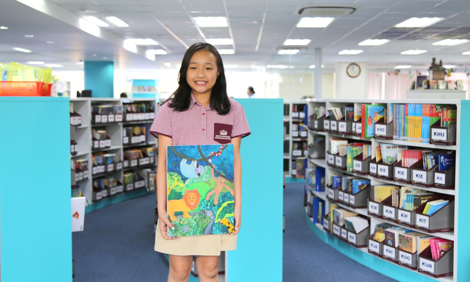 Khue and her winning artwork