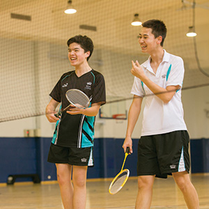 Boys playing badminton