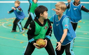 Two Boys Playing Sports