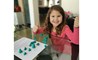 Leire making 3D shapes with playdough 540x329