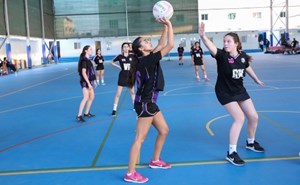 Girls playing basketball