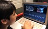 A Primary student edits a video project during virtual school