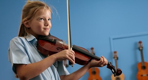 Student playing violin