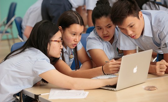 IBDP students working at computer | BIS HCMC