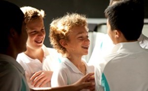 Young secondary students in drama class in the studio theatre