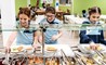 Primary Cafeteria ICS Students selecting meals