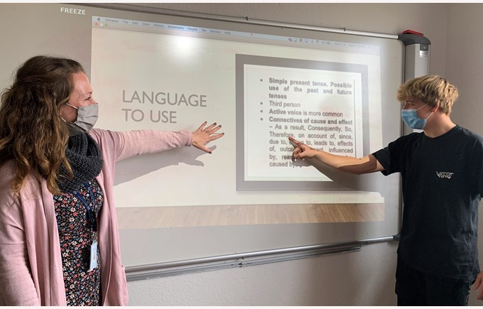 EAL teacher at ICS with student language to use mask 2020