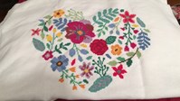 embroidery cross stitch sewing project in heart shape
