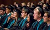 BISW British International School of Washington DC 2019 graduates listen to a graduation speaker.