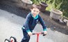 Young boy riding bike