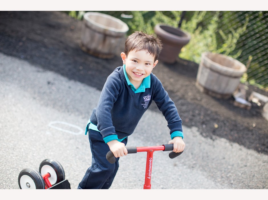 Young boy riding bike