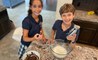 Shirin and Sam Bekker trying out a new recipe