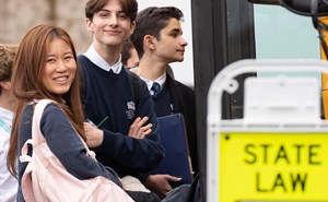 High School Students Getting onto Bus