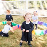 Toddlers playing outdoors