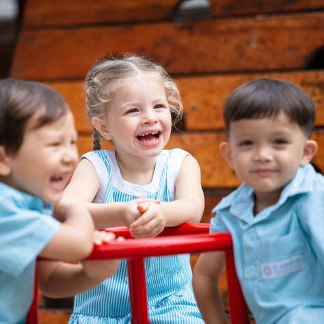 Two girls enjoying a International Primary curriculum lesson at St Andrews