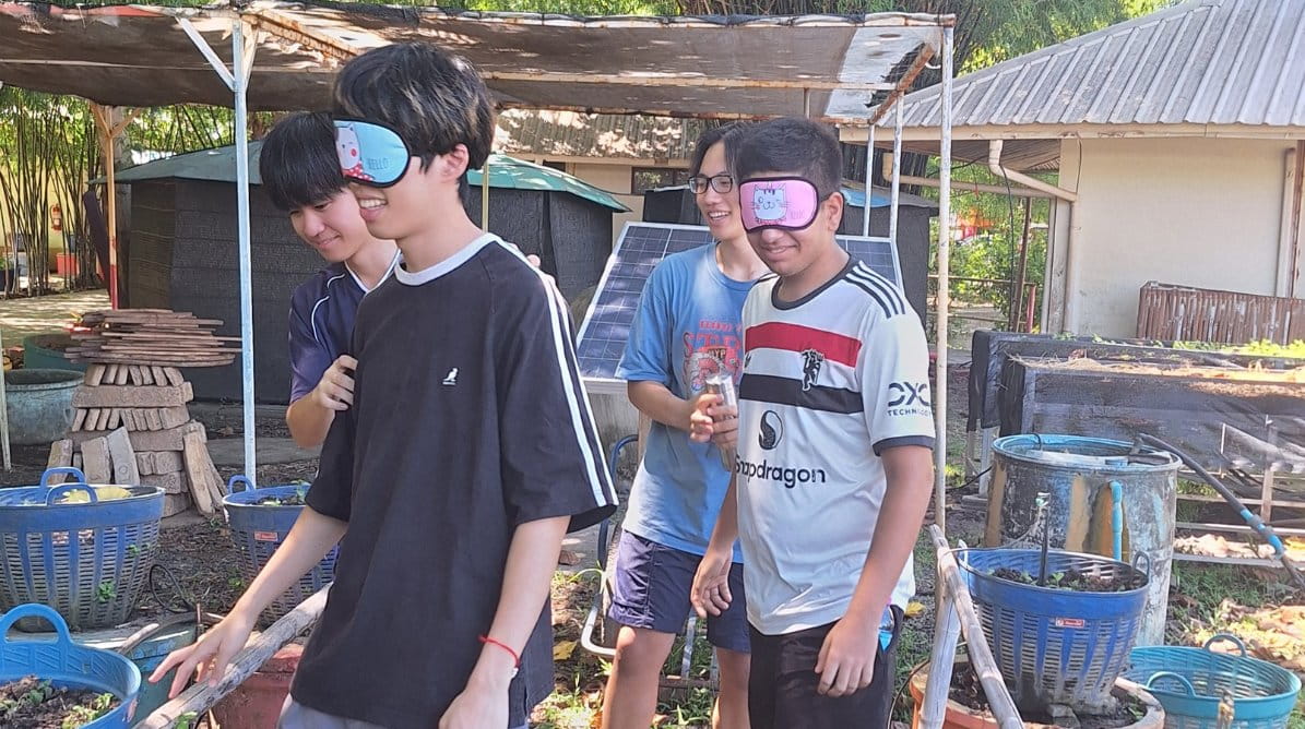 Students visit Mechai Pattana Bamboo School in northeast Thailand to learn about sustainable community development. - Mechai Pattana Bamboo School